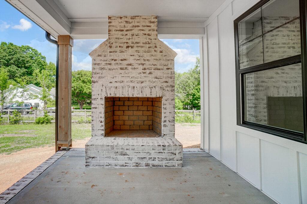 Custom Fireplace with Custom Home Design by Karrus Homes.